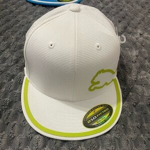White and green Puma golf hat